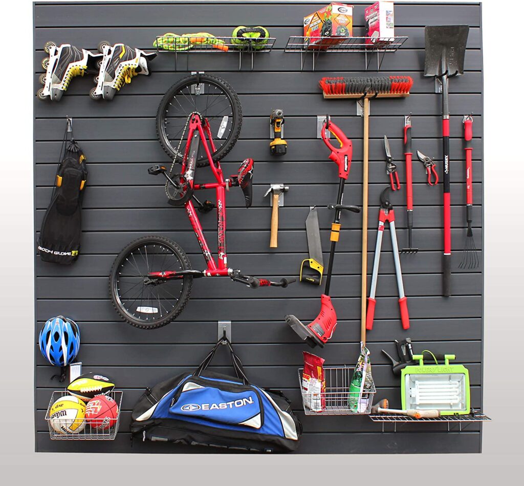 Garage slatwall organizer with sports gear