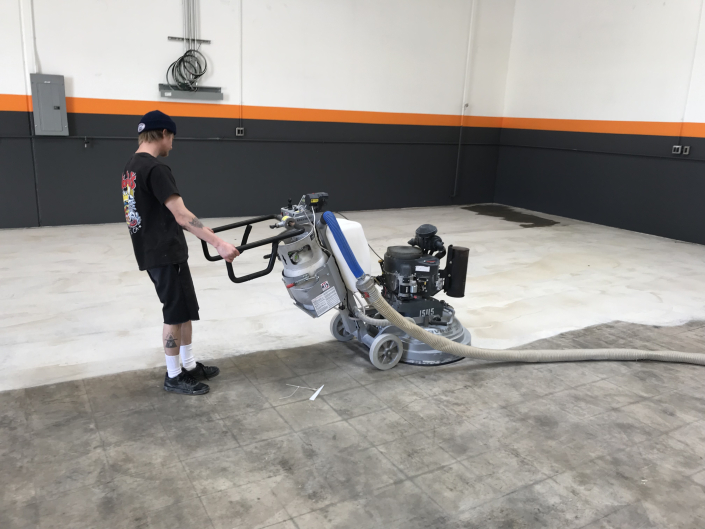 Diamond grinding concrete before a floor coating