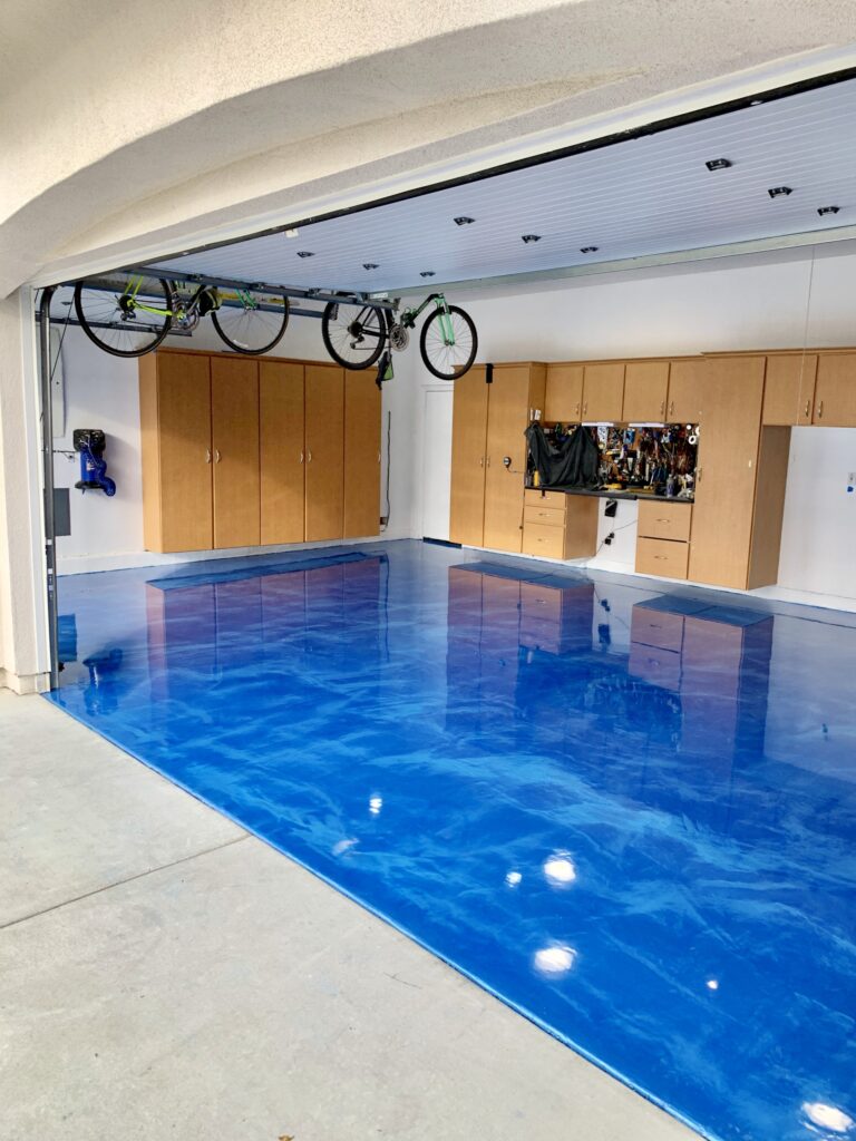 Blue metallic epoxy garage floor