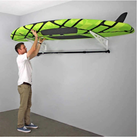 Stand up paddle board ceiling rack in a garage