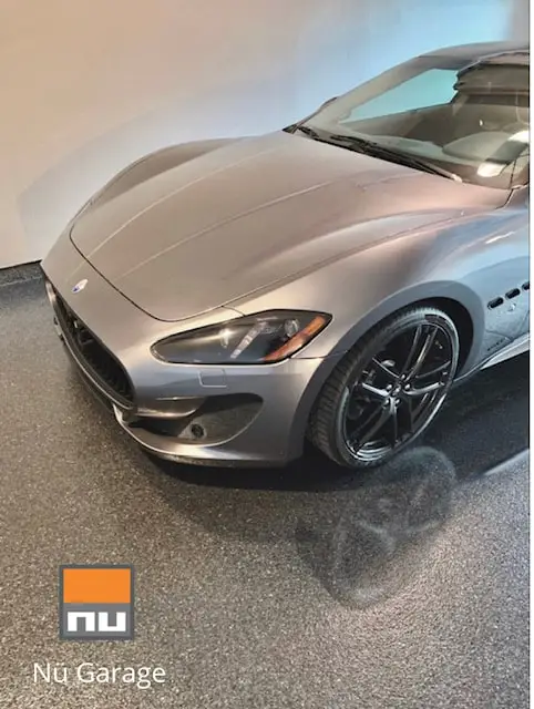Silver sports car parked on a finished epoxy garage floor
